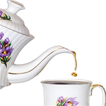A teapot pouring tea
